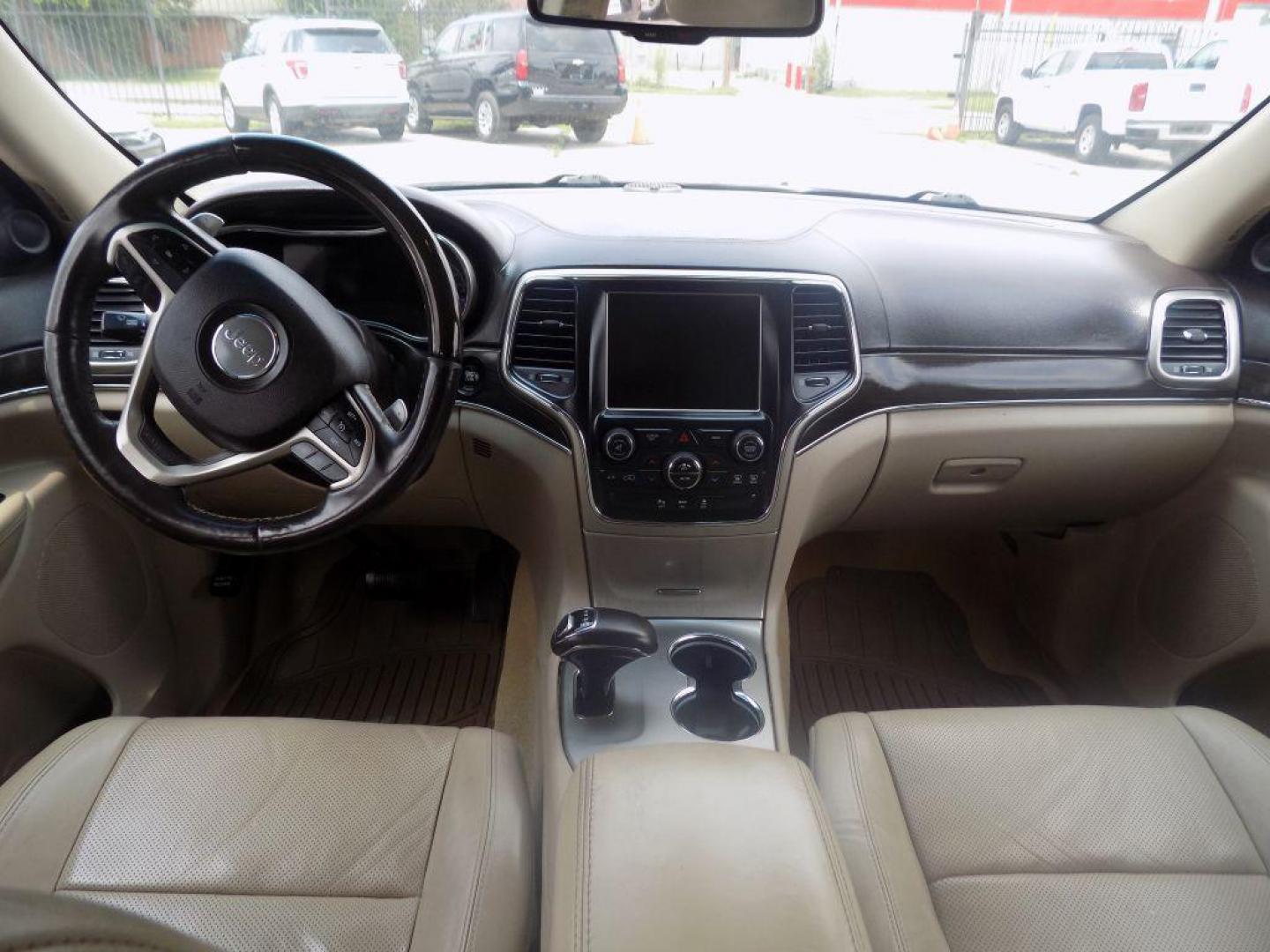 2014 BLACK JEEP GRAND CHEROKEE OVERLAND (1C4RJECT8EC) with an 5.7L engine, Automatic transmission, located at 830 E. Canino Rd., Houston, TX, 77037, (281) 405-0440, 38.358219, -81.729942 - Photo#16