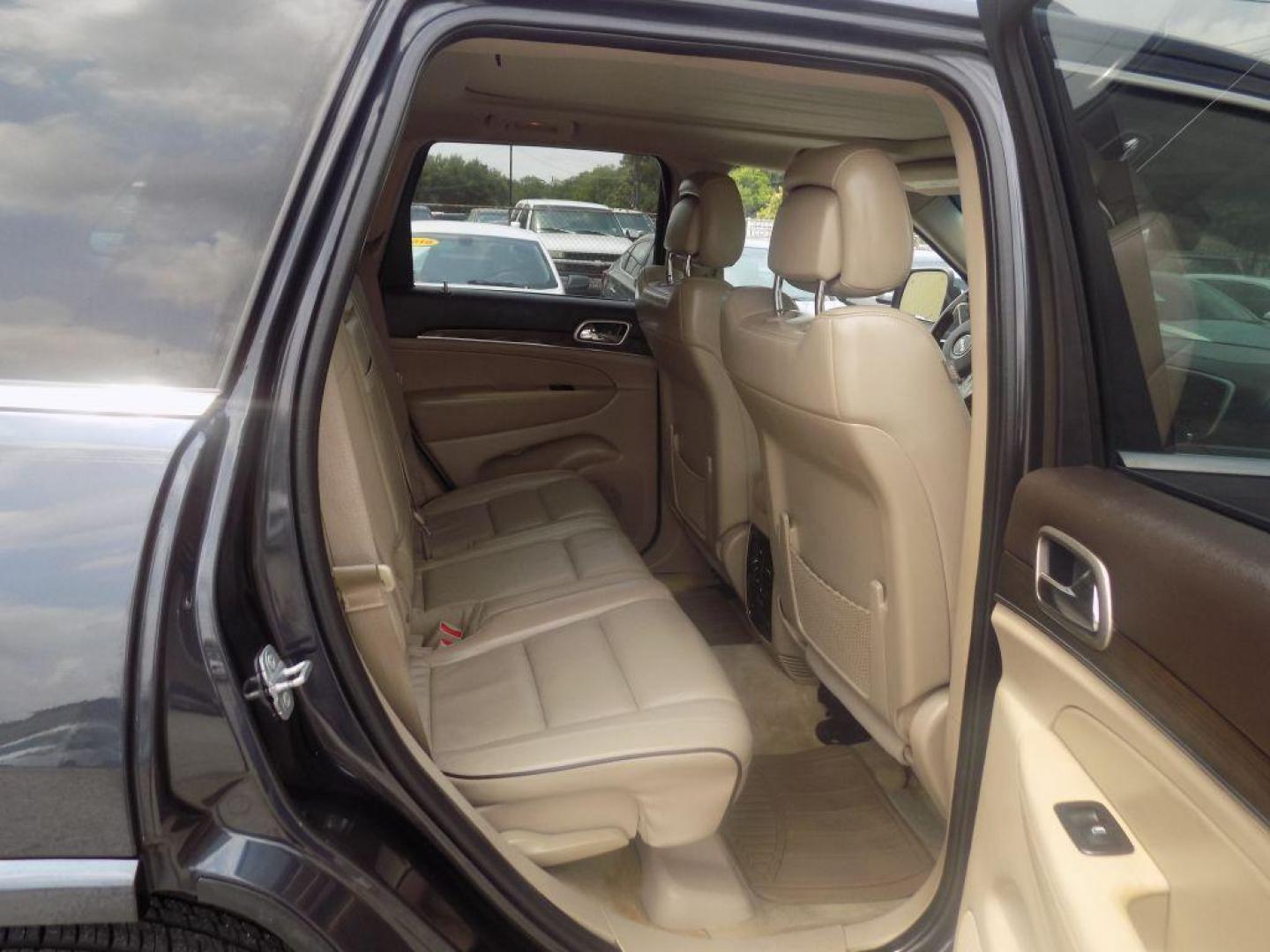 2014 BLACK JEEP GRAND CHEROKEE OVERLAND (1C4RJECT8EC) with an 5.7L engine, Automatic transmission, located at 830 E. Canino Rd., Houston, TX, 77037, (281) 405-0440, 38.358219, -81.729942 - Photo#19