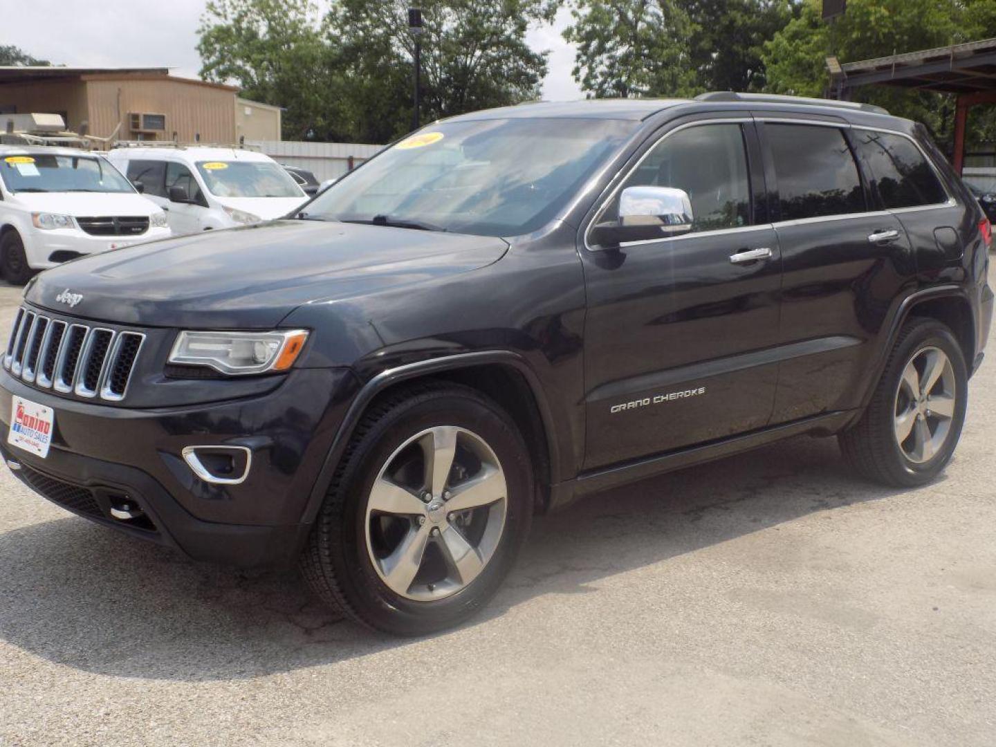 2014 BLACK JEEP GRAND CHEROKEE OVERLAND (1C4RJECT8EC) with an 5.7L engine, Automatic transmission, located at 830 E. Canino Rd., Houston, TX, 77037, (281) 405-0440, 38.358219, -81.729942 - Photo#3