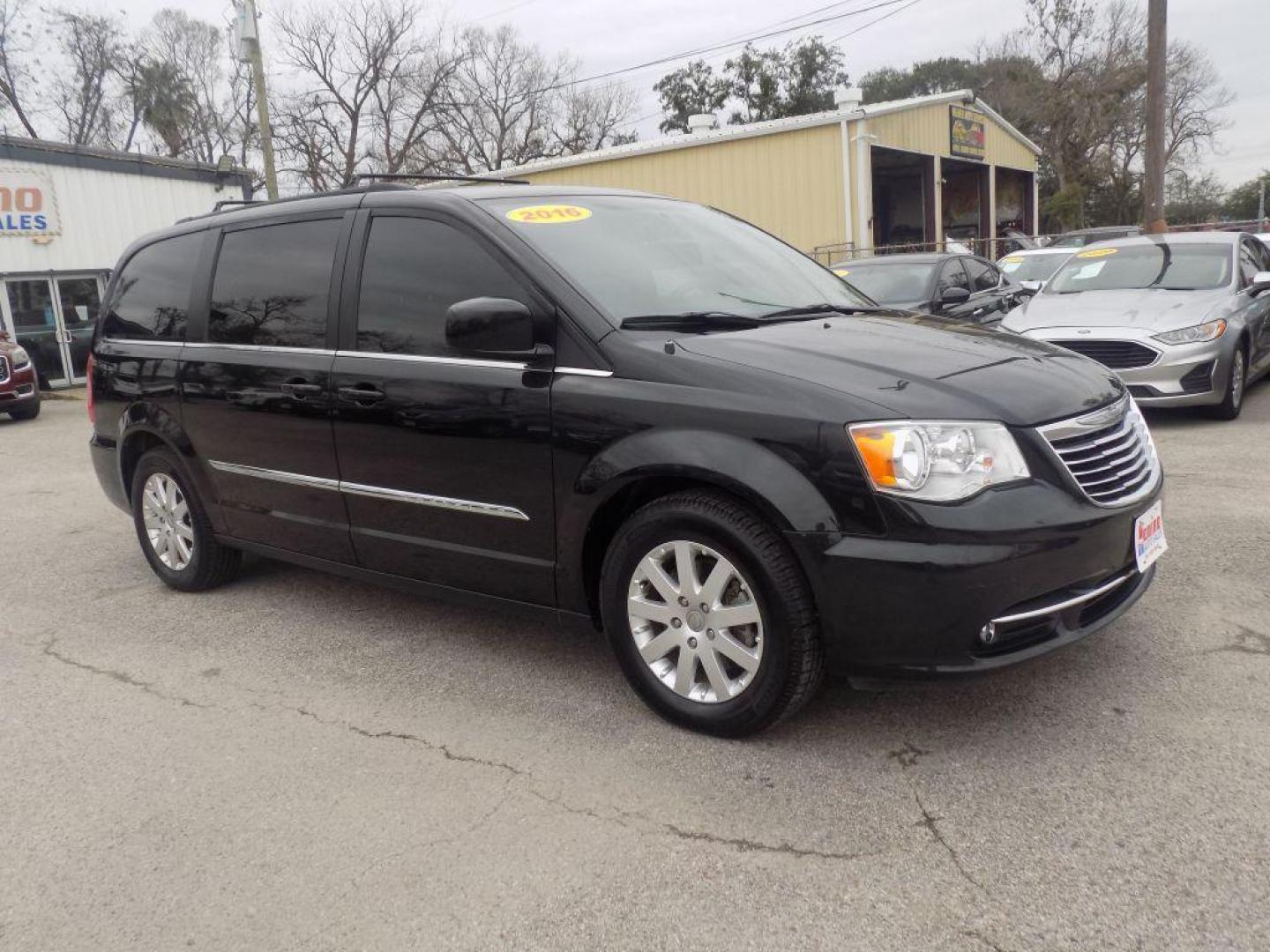 2016 BLACK CHRYSLER TOWN and COUNTRY TOURING (2C4RC1BG4GR) with an 3.6L engine, Automatic transmission, located at 830 E. Canino Rd., Houston, TX, 77037, (281) 405-0440, 38.358219, -81.729942 - Photo#1