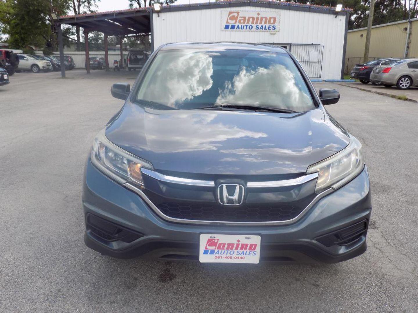 2015 GRAY HONDA CR-V LX (2HKRM3H39FH) with an 2.4L engine, Continuously Variable transmission, located at 830 E. Canino Rd., Houston, TX, 77037, (281) 405-0440, 38.358219, -81.729942 - Photo#0