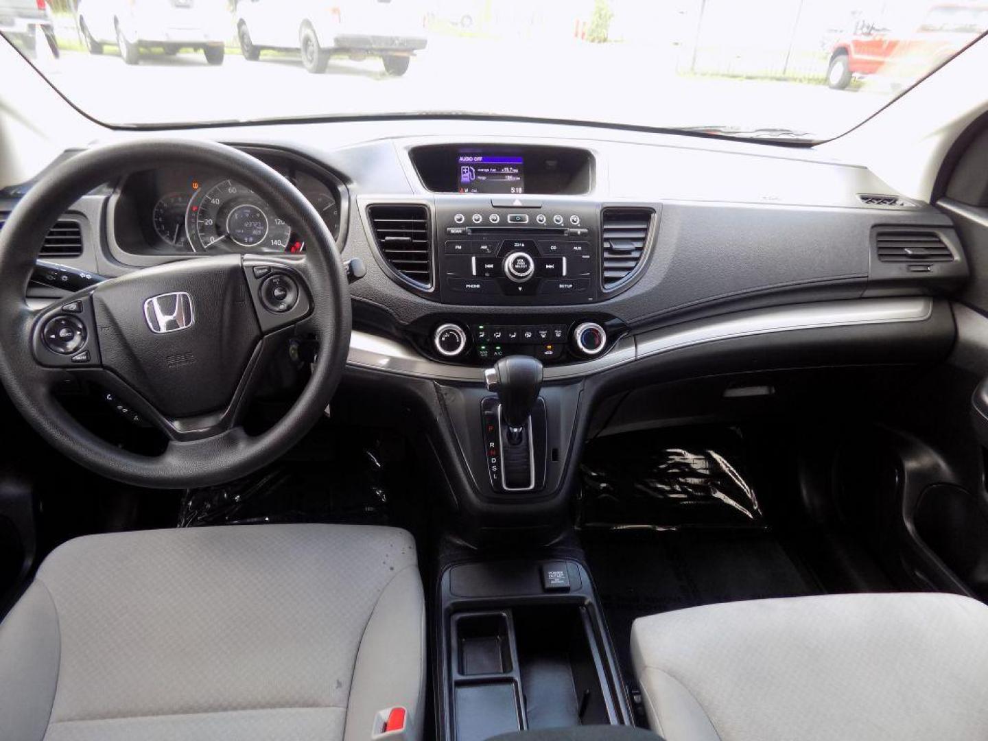 2015 GRAY HONDA CR-V LX (2HKRM3H39FH) with an 2.4L engine, Continuously Variable transmission, located at 830 E. Canino Rd., Houston, TX, 77037, (281) 405-0440, 38.358219, -81.729942 - Photo#14