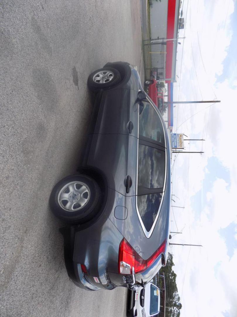 2015 GRAY HONDA CR-V LX (2HKRM3H39FH) with an 2.4L engine, Continuously Variable transmission, located at 830 E. Canino Rd., Houston, TX, 77037, (281) 405-0440, 38.358219, -81.729942 - Photo#4