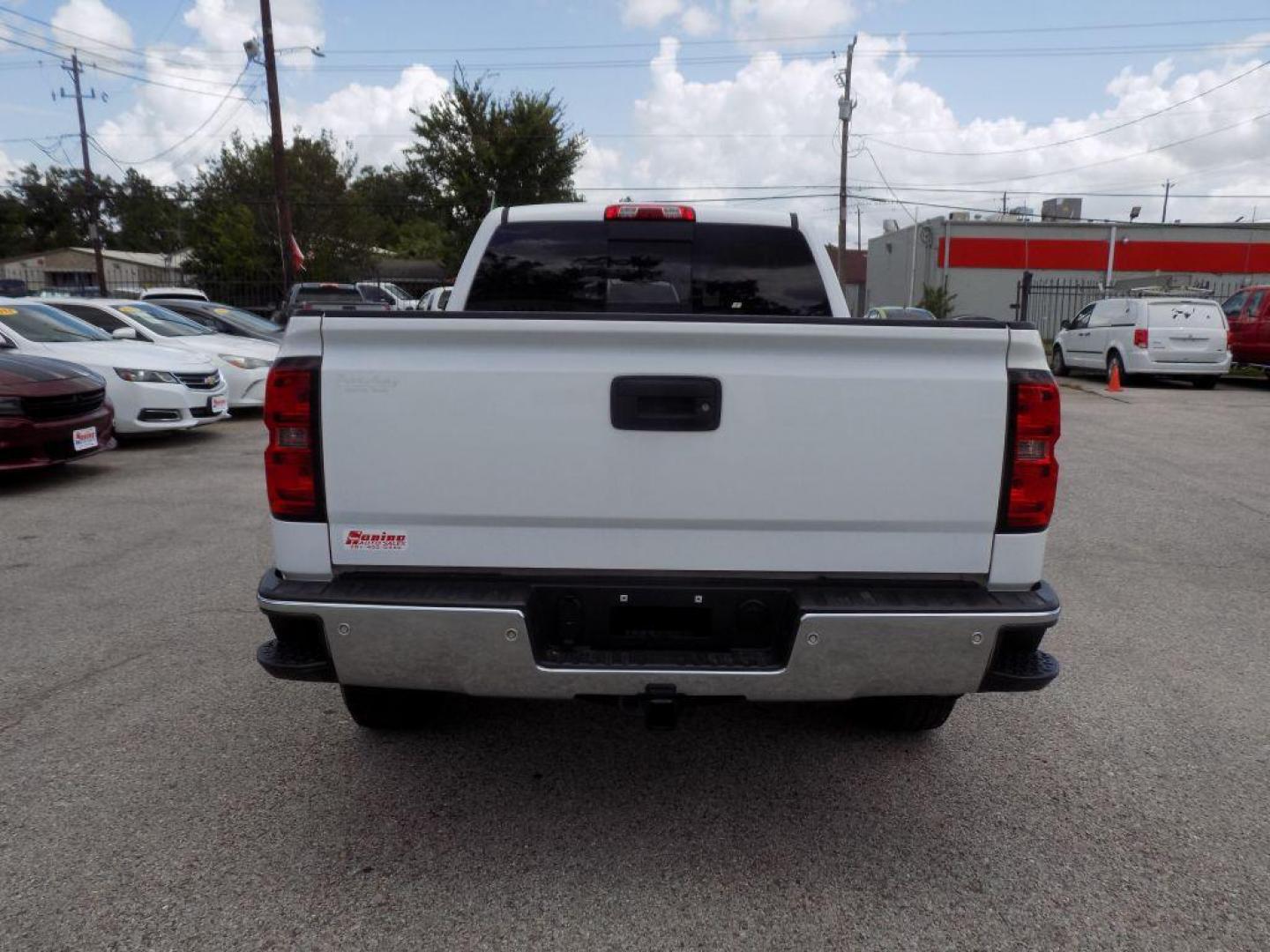 2016 WHITE CHEVROLET SILVERADO 1500 LT (1GCRCREC2GZ) with an 5.3L engine, Automatic transmission, located at 830 E. Canino Rd., Houston, TX, 77037, (281) 405-0440, 38.358219, -81.729942 - Photo#2
