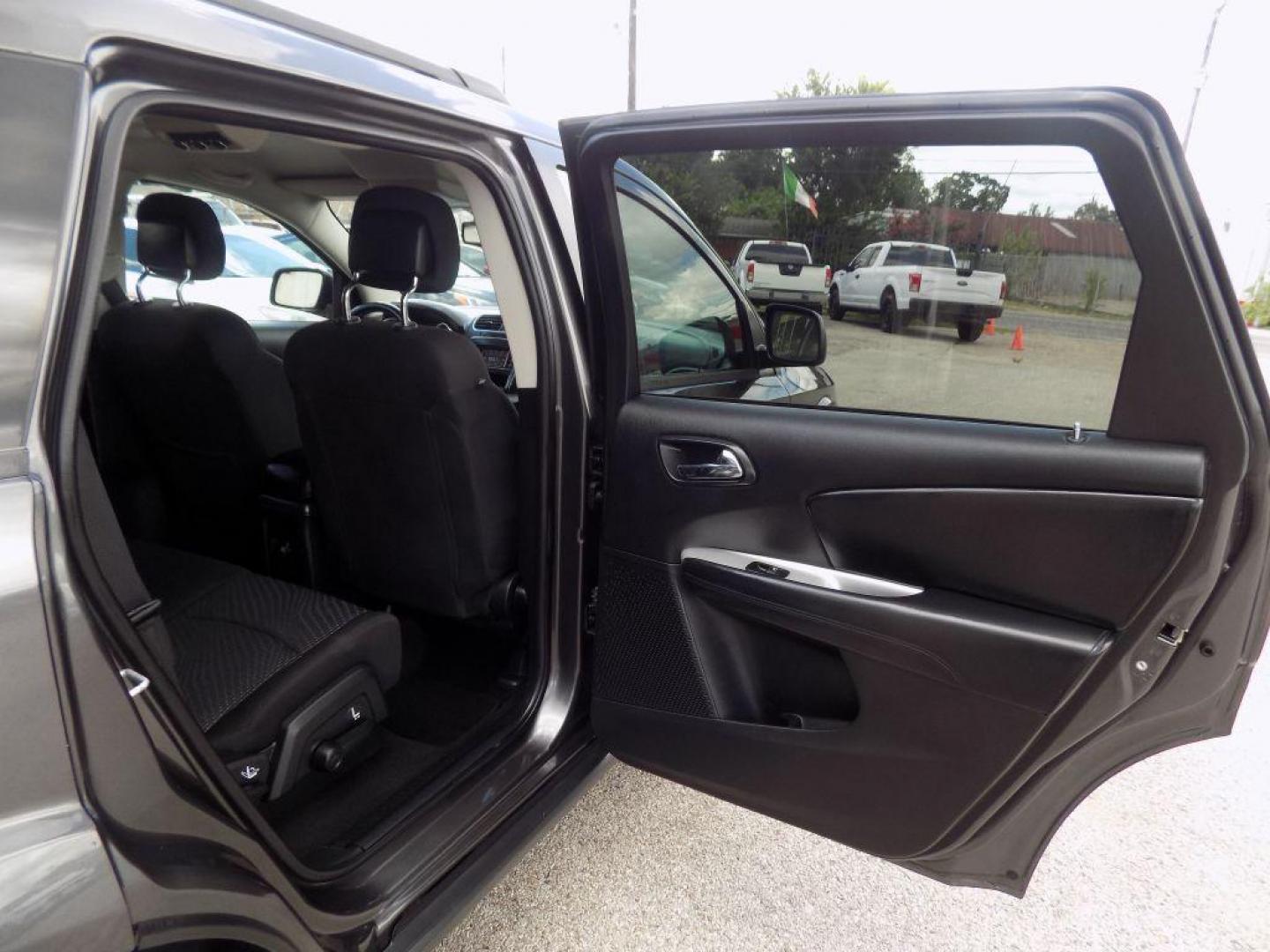 2016 GRAY DODGE JOURNEY SE (3C4PDCAB8GT) with an 2.4L engine, Automatic transmission, located at 830 E. Canino Rd., Houston, TX, 77037, (281) 405-0440, 38.358219, -81.729942 - Photo#10