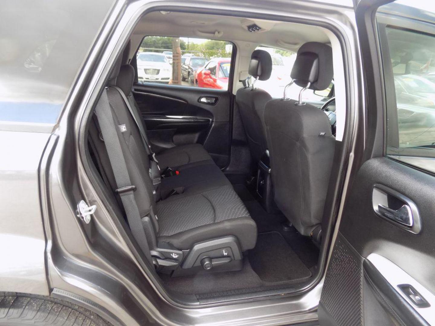2016 GRAY DODGE JOURNEY SE (3C4PDCAB8GT) with an 2.4L engine, Automatic transmission, located at 830 E. Canino Rd., Houston, TX, 77037, (281) 405-0440, 38.358219, -81.729942 - Photo#11