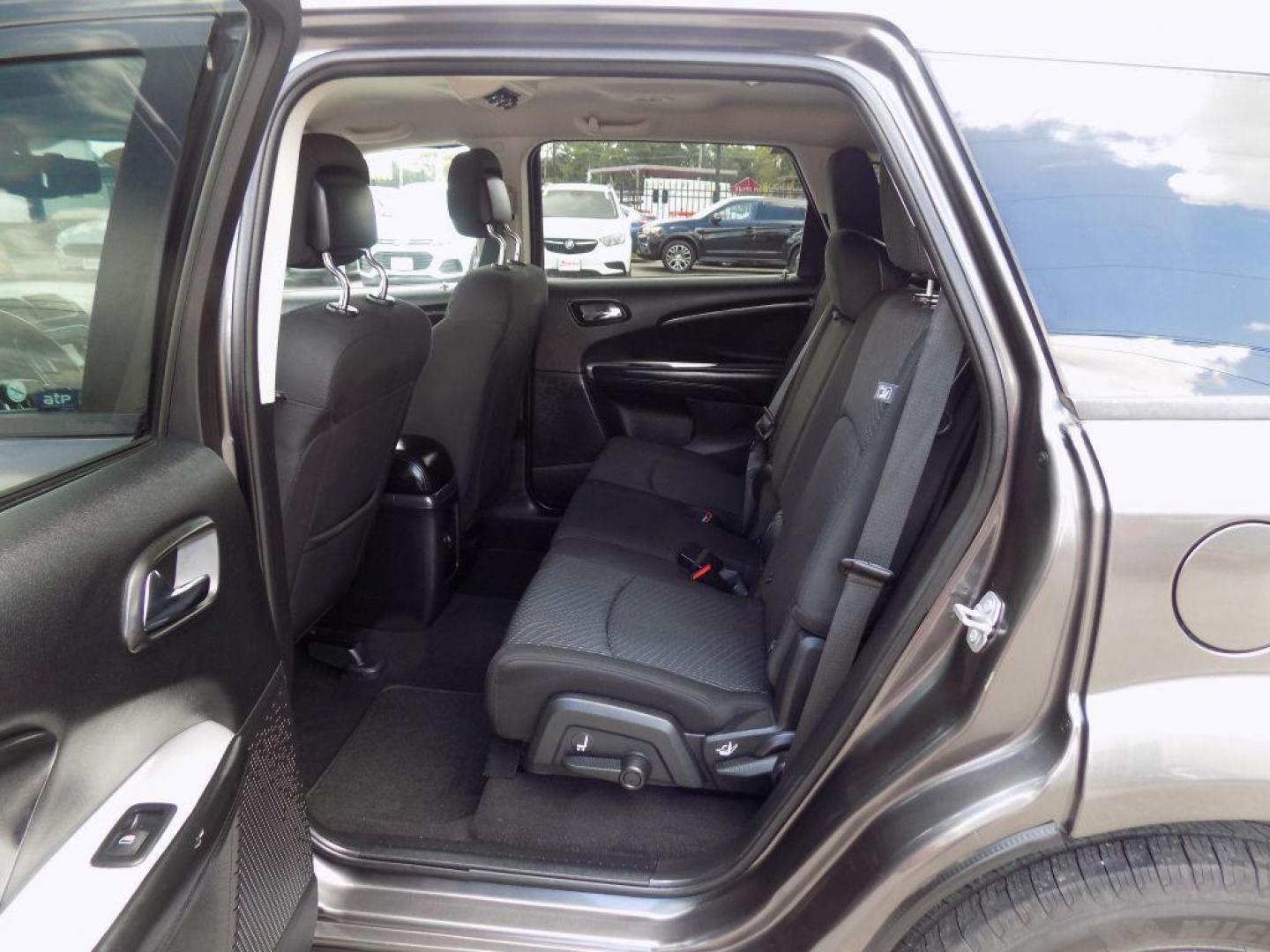 2016 GRAY DODGE JOURNEY SE (3C4PDCAB8GT) with an 2.4L engine, Automatic transmission, located at 830 E. Canino Rd., Houston, TX, 77037, (281) 405-0440, 38.358219, -81.729942 - Photo#13