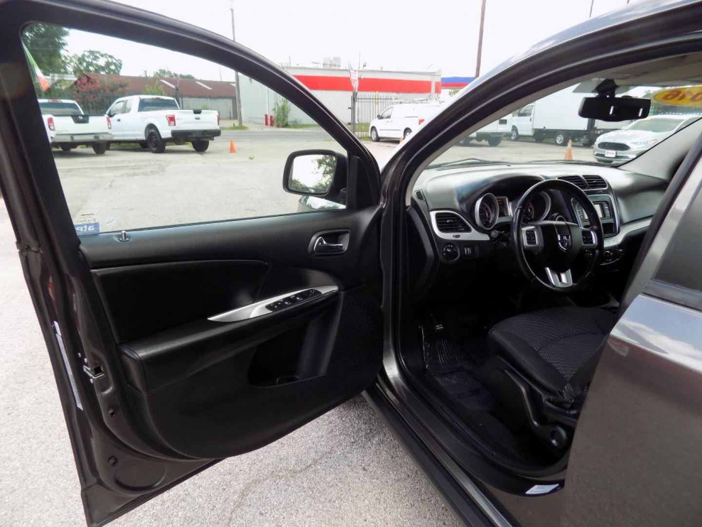 2016 GRAY DODGE JOURNEY SE (3C4PDCAB8GT) with an 2.4L engine, Automatic transmission, located at 830 E. Canino Rd., Houston, TX, 77037, (281) 405-0440, 38.358219, -81.729942 - Photo#15