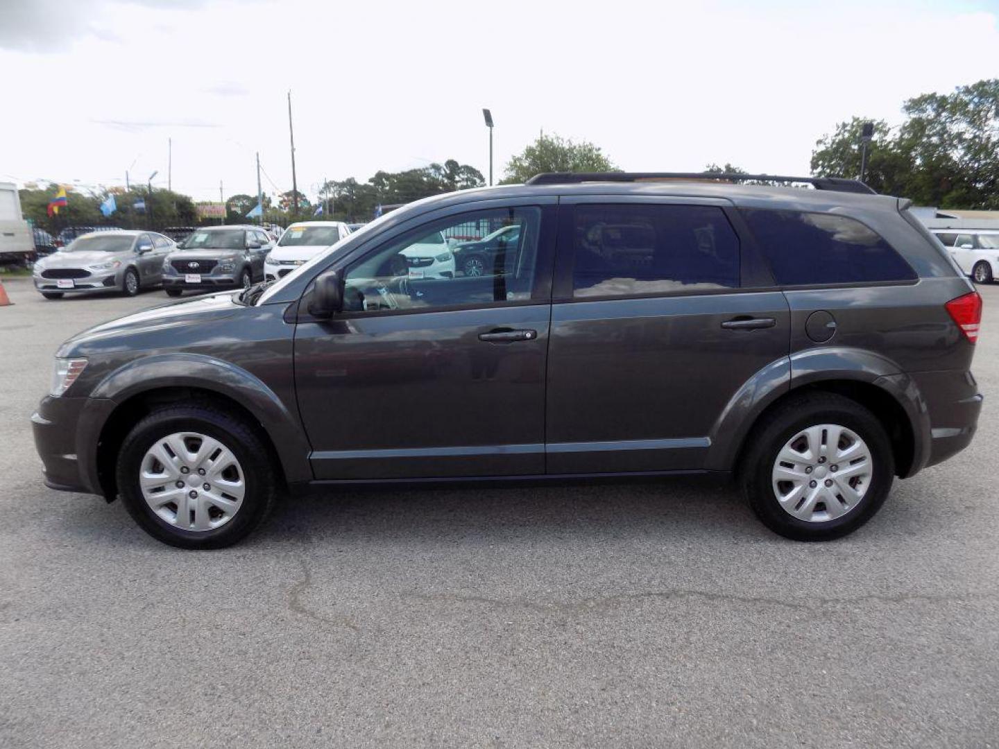 2016 GRAY DODGE JOURNEY SE (3C4PDCAB8GT) with an 2.4L engine, Automatic transmission, located at 830 E. Canino Rd., Houston, TX, 77037, (281) 405-0440, 38.358219, -81.729942 - Photo#3