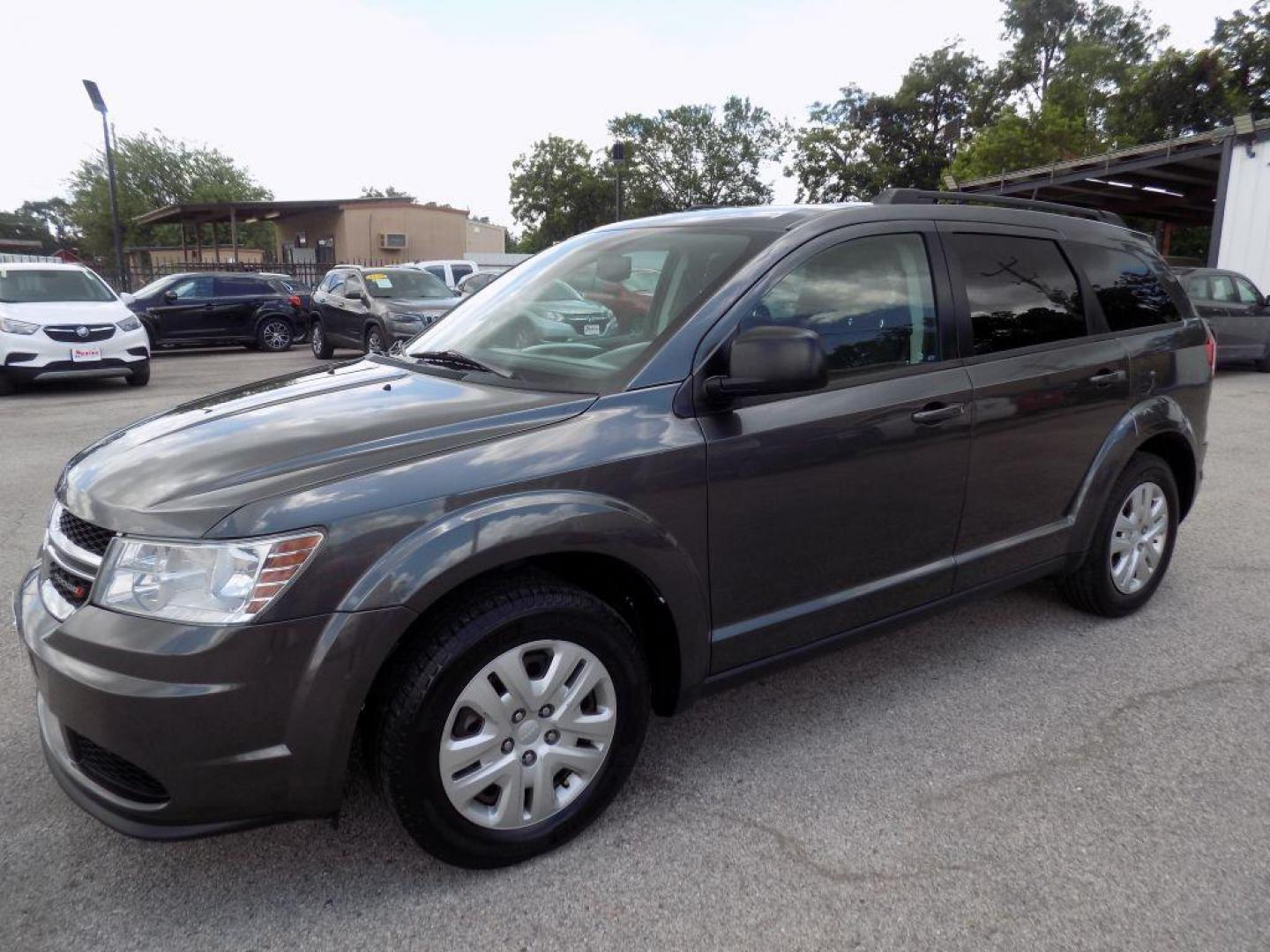 2016 GRAY DODGE JOURNEY SE (3C4PDCAB8GT) with an 2.4L engine, Automatic transmission, located at 830 E. Canino Rd., Houston, TX, 77037, (281) 405-0440, 38.358219, -81.729942 - Photo#5