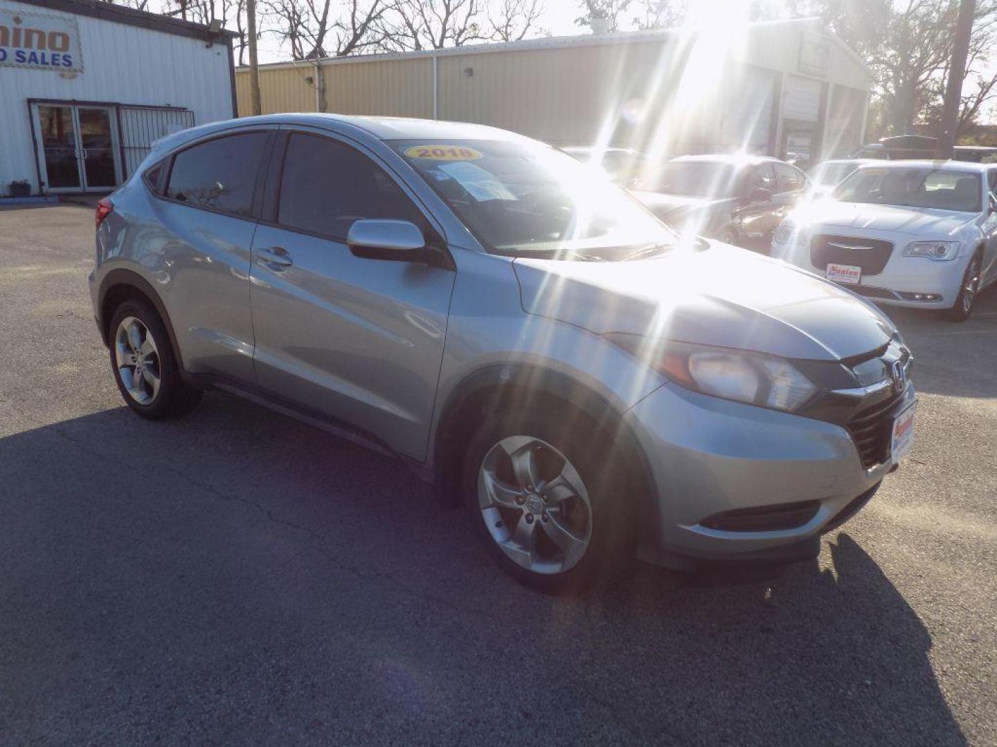 2018 SILVER HONDA HR-V LX (3CZRU5H3XJG) with an 1.8L engine, Continuously Variable transmission, located at 830 E. Canino Rd., Houston, TX, 77037, (281) 405-0440, 38.358219, -81.729942 - Photo#6