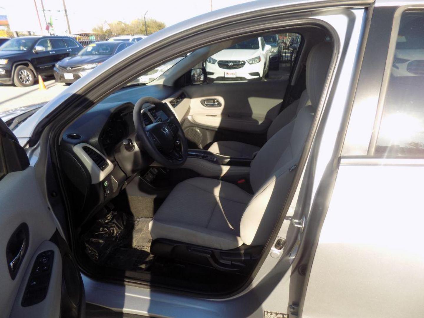 2018 SILVER HONDA HR-V LX (3CZRU5H3XJG) with an 1.8L engine, Continuously Variable transmission, located at 830 E. Canino Rd., Houston, TX, 77037, (281) 405-0440, 38.358219, -81.729942 - Photo#16