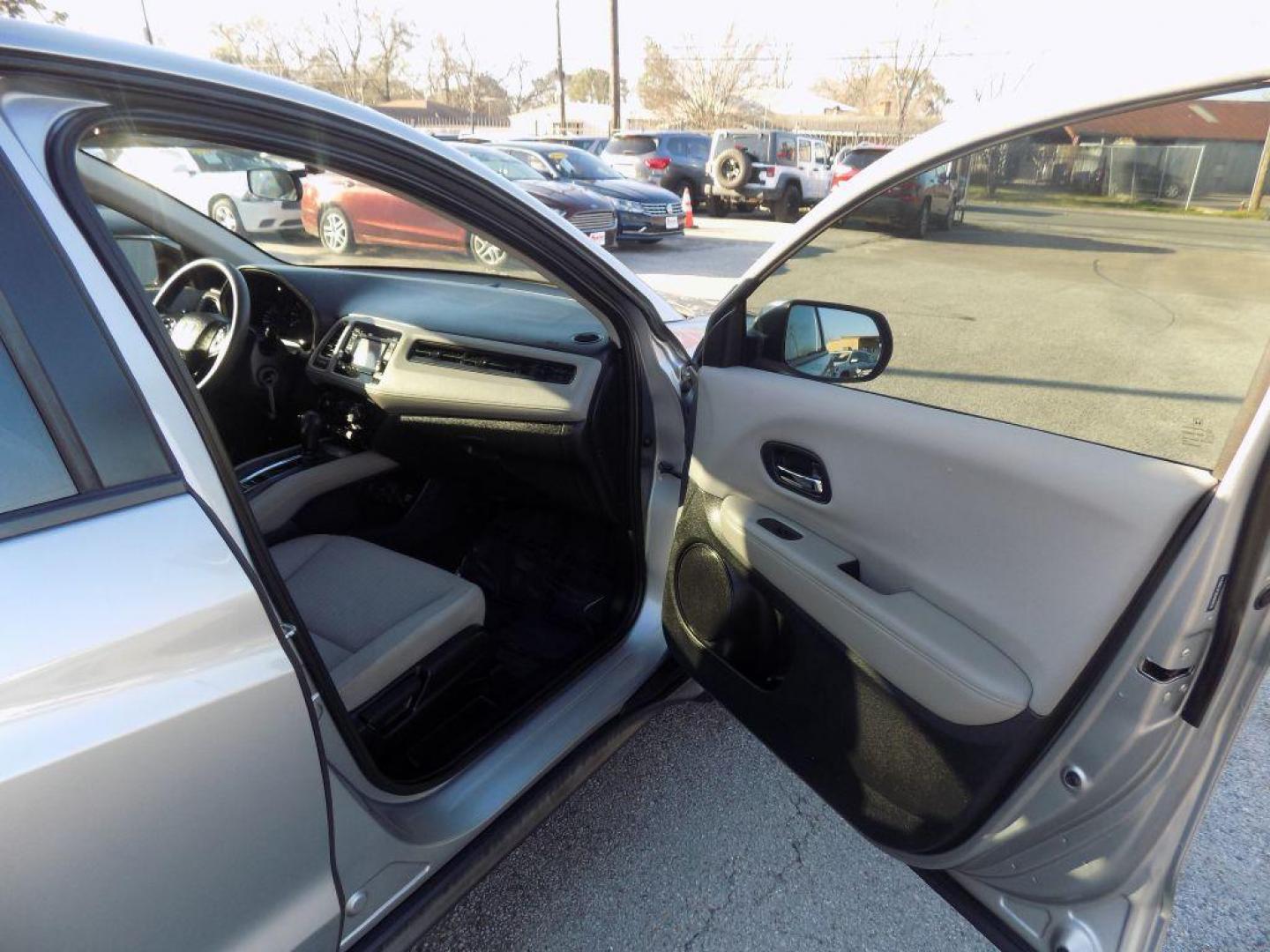 2018 SILVER HONDA HR-V LX (3CZRU5H3XJG) with an 1.8L engine, Continuously Variable transmission, located at 830 E. Canino Rd., Houston, TX, 77037, (281) 405-0440, 38.358219, -81.729942 - Photo#8
