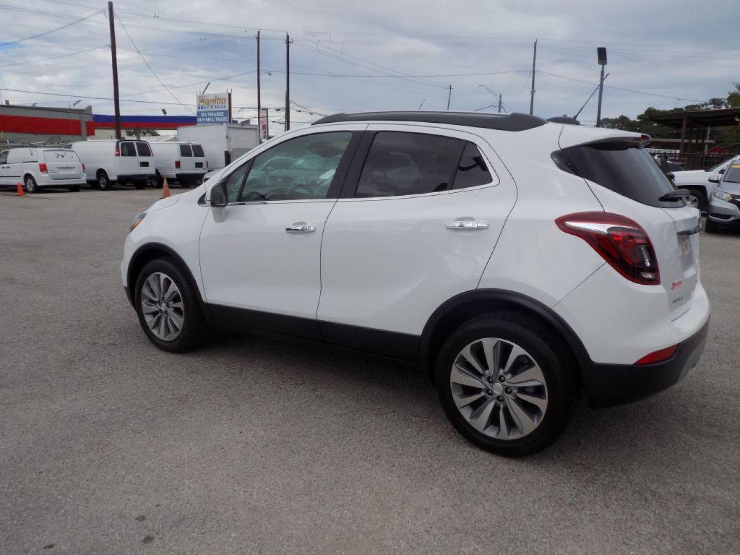 2018 WHITE BUICK ENCORE PREFERRED (KL4CJASB3JB) with an 1.4L engine, Automatic transmission, located at 830 E. Canino Rd., Houston, TX, 77037, (281) 405-0440, 38.358219, -81.729942 - Photo#4