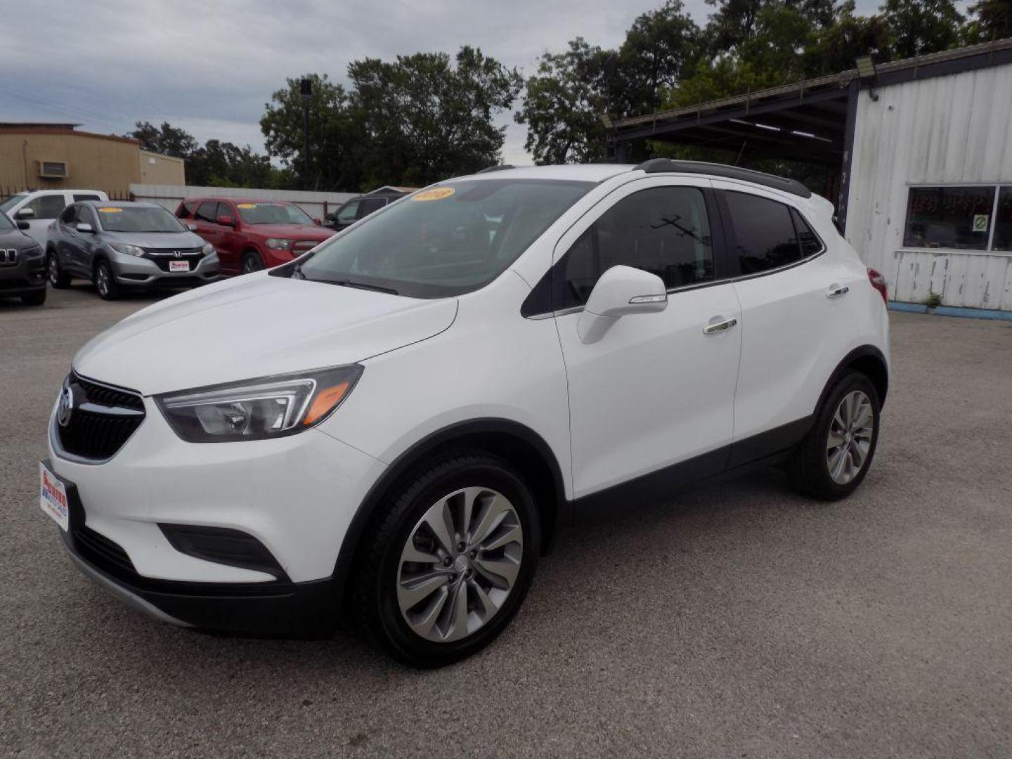 2018 WHITE BUICK ENCORE PREFERRED (KL4CJASB3JB) with an 1.4L engine, Automatic transmission, located at 830 E. Canino Rd., Houston, TX, 77037, (281) 405-0440, 38.358219, -81.729942 - Photo#5