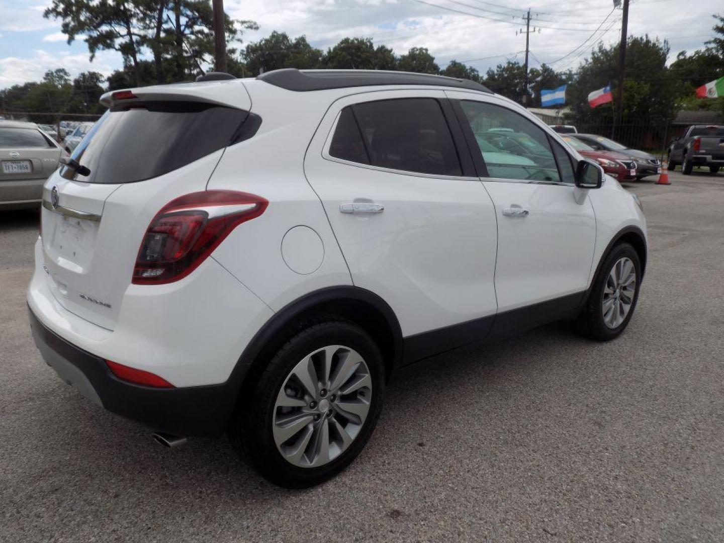 2018 WHITE BUICK ENCORE PREFERRED (KL4CJASB3JB) with an 1.4L engine, Automatic transmission, located at 830 E. Canino Rd., Houston, TX, 77037, (281) 405-0440, 38.358219, -81.729942 - Photo#7