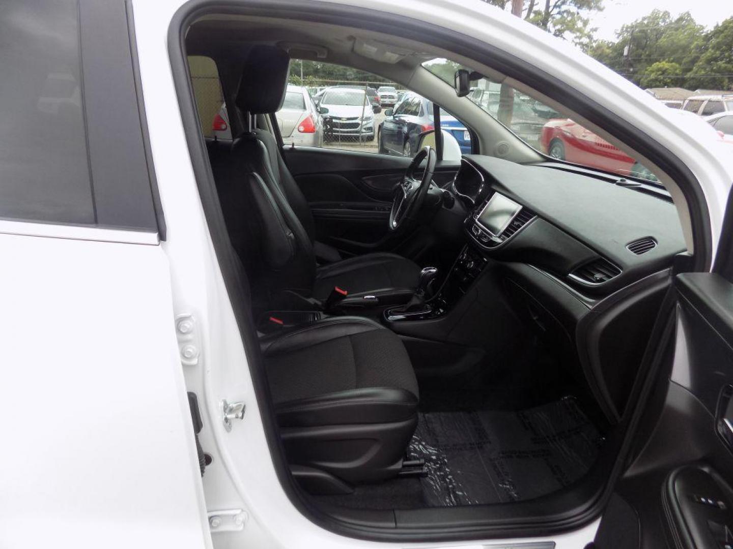 2018 WHITE BUICK ENCORE PREFERRED (KL4CJASB3JB) with an 1.4L engine, Automatic transmission, located at 830 E. Canino Rd., Houston, TX, 77037, (281) 405-0440, 38.358219, -81.729942 - Photo#9