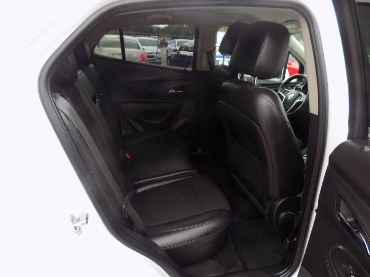 2018 WHITE BUICK ENCORE PREFERRED (KL4CJASB3JB) with an 1.4L engine, Automatic transmission, located at 830 E. Canino Rd., Houston, TX, 77037, (281) 405-0440, 38.358219, -81.729942 - Photo#11