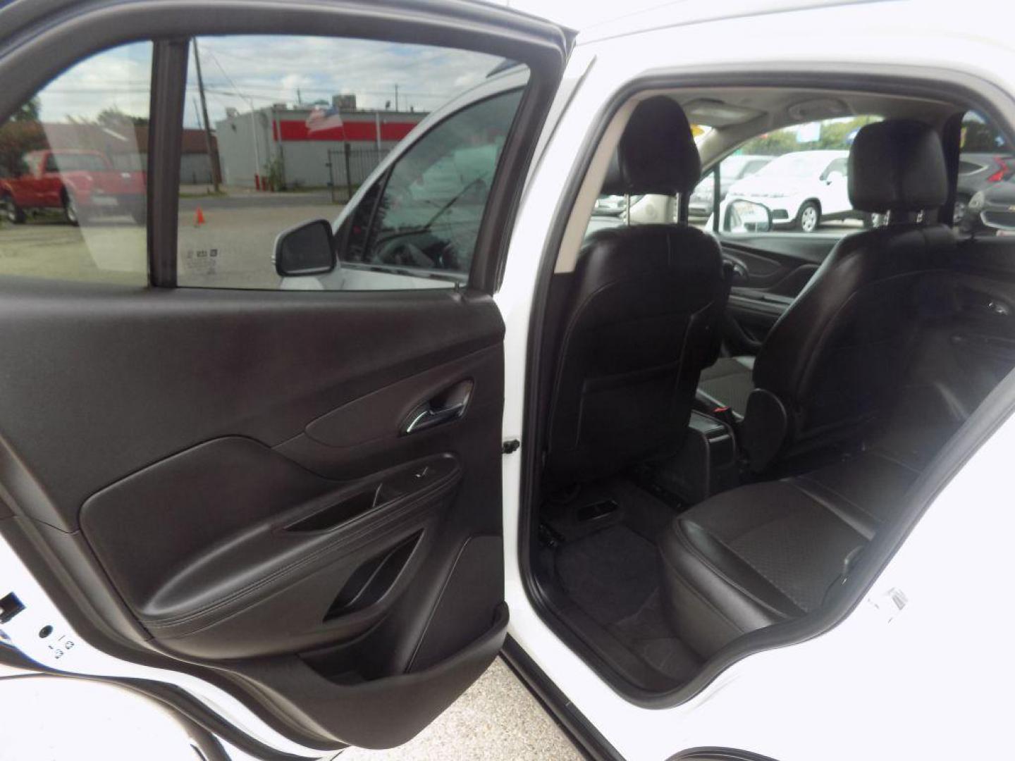 2018 WHITE BUICK ENCORE PREFERRED (KL4CJASB3JB) with an 1.4L engine, Automatic transmission, located at 830 E. Canino Rd., Houston, TX, 77037, (281) 405-0440, 38.358219, -81.729942 - Photo#12