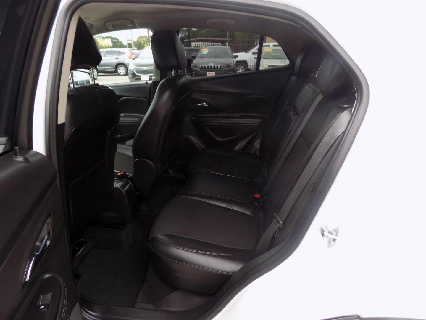 2018 WHITE BUICK ENCORE PREFERRED (KL4CJASB3JB) with an 1.4L engine, Automatic transmission, located at 830 E. Canino Rd., Houston, TX, 77037, (281) 405-0440, 38.358219, -81.729942 - Photo#13