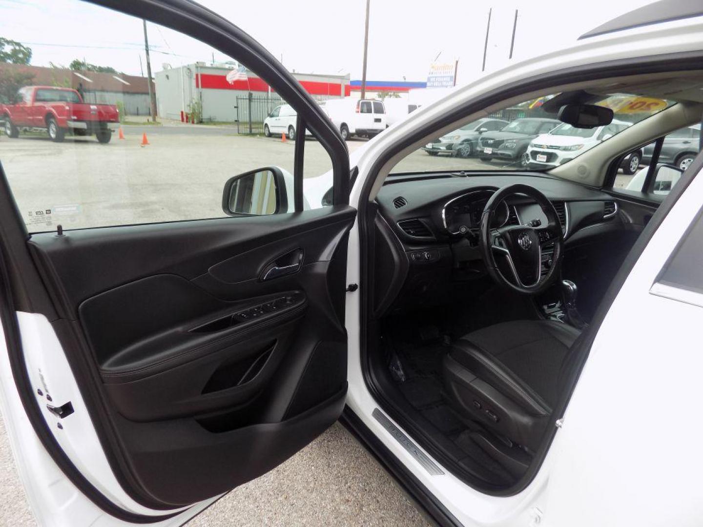 2018 WHITE BUICK ENCORE PREFERRED (KL4CJASB3JB) with an 1.4L engine, Automatic transmission, located at 830 E. Canino Rd., Houston, TX, 77037, (281) 405-0440, 38.358219, -81.729942 - Photo#15