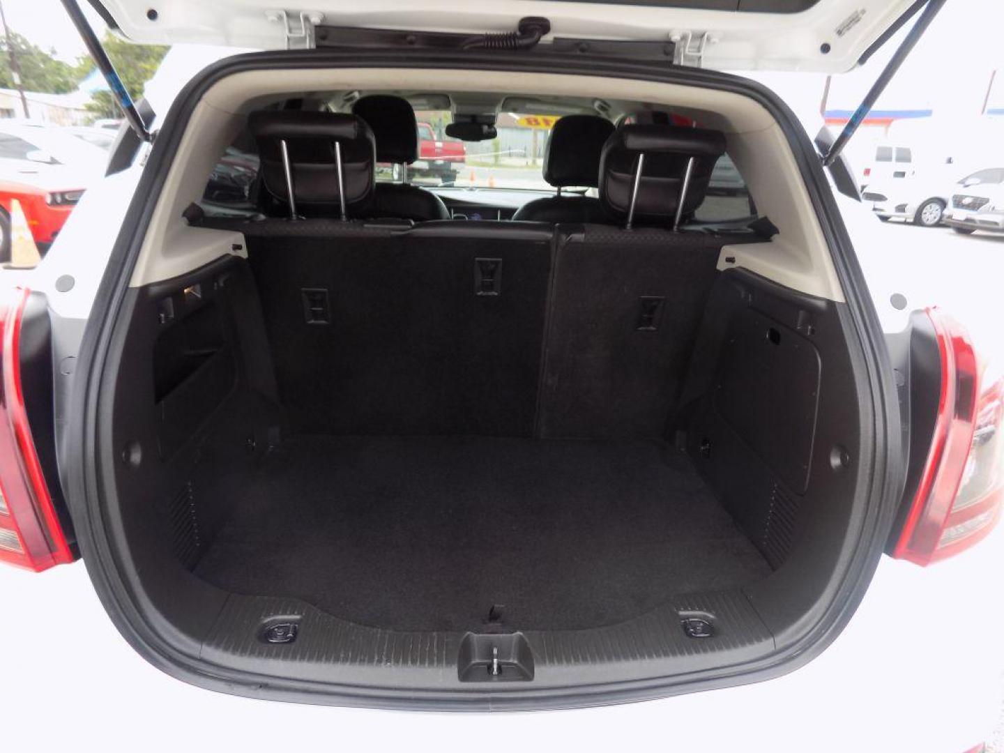 2018 WHITE BUICK ENCORE PREFERRED (KL4CJASB3JB) with an 1.4L engine, Automatic transmission, located at 830 E. Canino Rd., Houston, TX, 77037, (281) 405-0440, 38.358219, -81.729942 - Photo#17