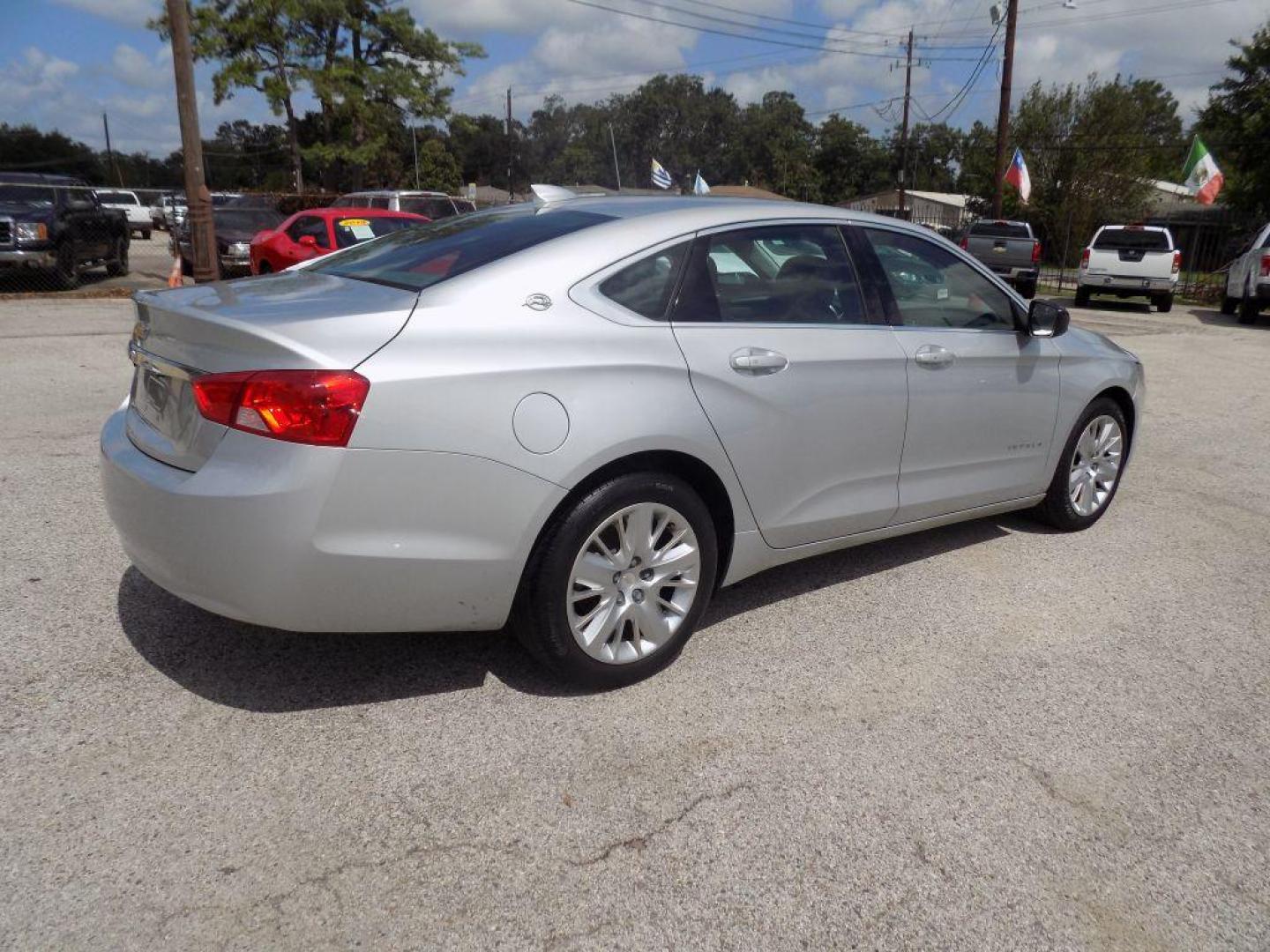 2018 SILVER CHEVROLET IMPALA LS (2G11X5SA4J9) with an 2.5L engine, Automatic transmission, located at 830 E. Canino Rd., Houston, TX, 77037, (281) 405-0440, 38.358219, -81.729942 - Photo#7