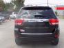 2013 GREEN JEEP GRAND CHEROKEE LIMITED (1C4RJEBT8DC) with an 5.7L engine, Automatic transmission, located at 830 E. Canino Rd., Houston, TX, 77037, (281) 405-0440, 38.358219, -81.729942 - Photo#2