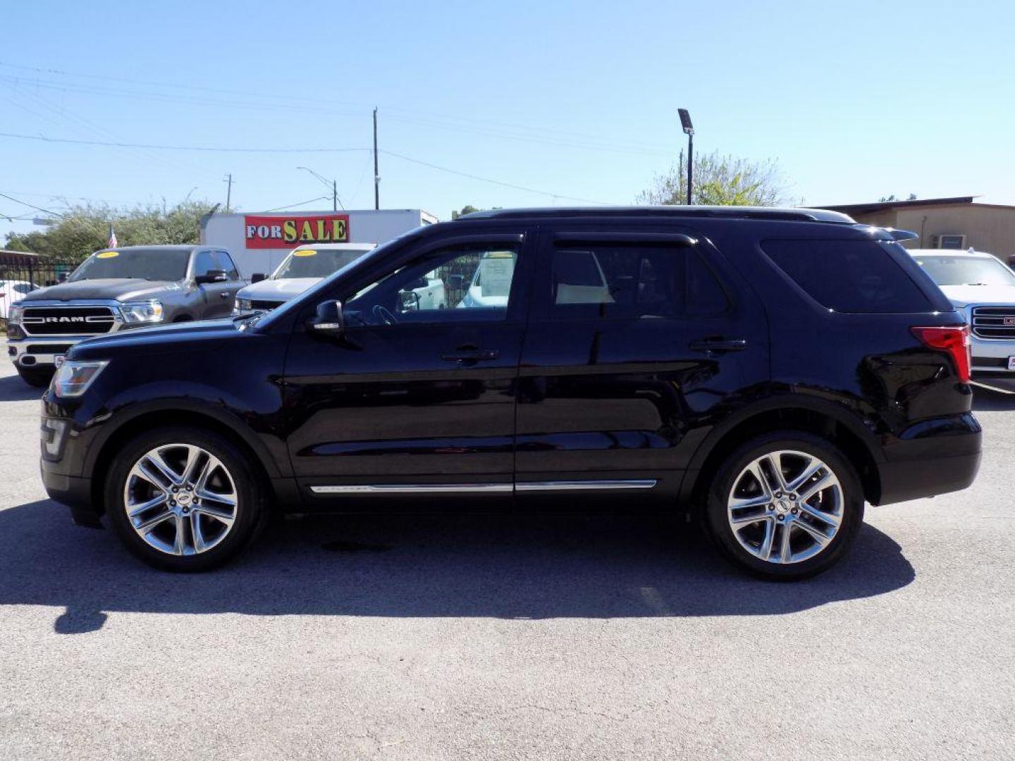 2016 BLACK FORD EXPLORER XLT (1FM5K7D8XGG) with an 3.5L engine, Automatic transmission, located at 830 E. Canino Rd., Houston, TX, 77037, (281) 405-0440, 38.358219, -81.729942 - Photo#2