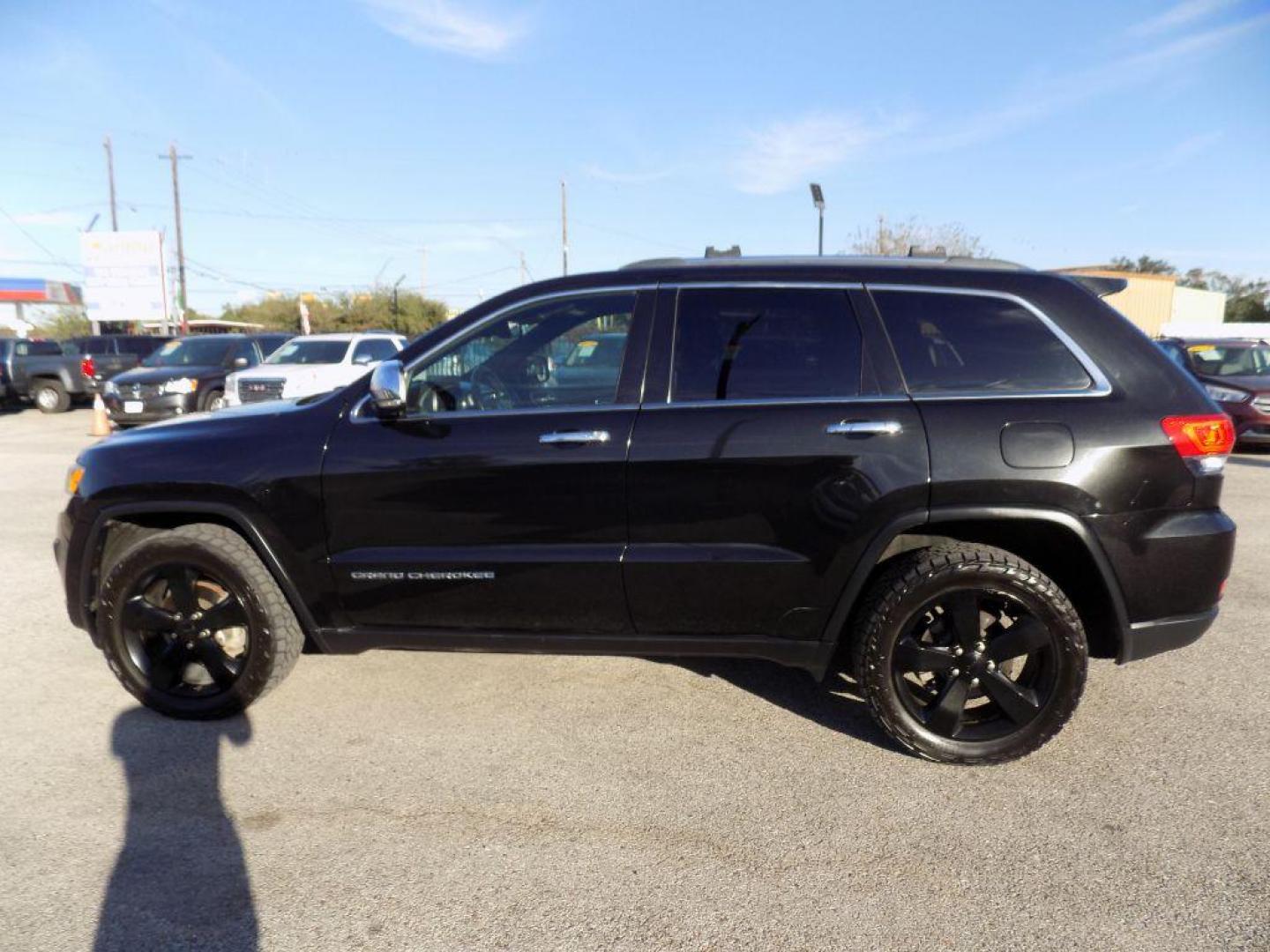 2015 BLACK JEEP GRAND CHEROKEE LIMITED (1C4RJFBG2FC) with an 3.6L engine, Automatic transmission, located at 830 E. Canino Rd., Houston, TX, 77037, (281) 405-0440, 38.358219, -81.729942 - Photo#3
