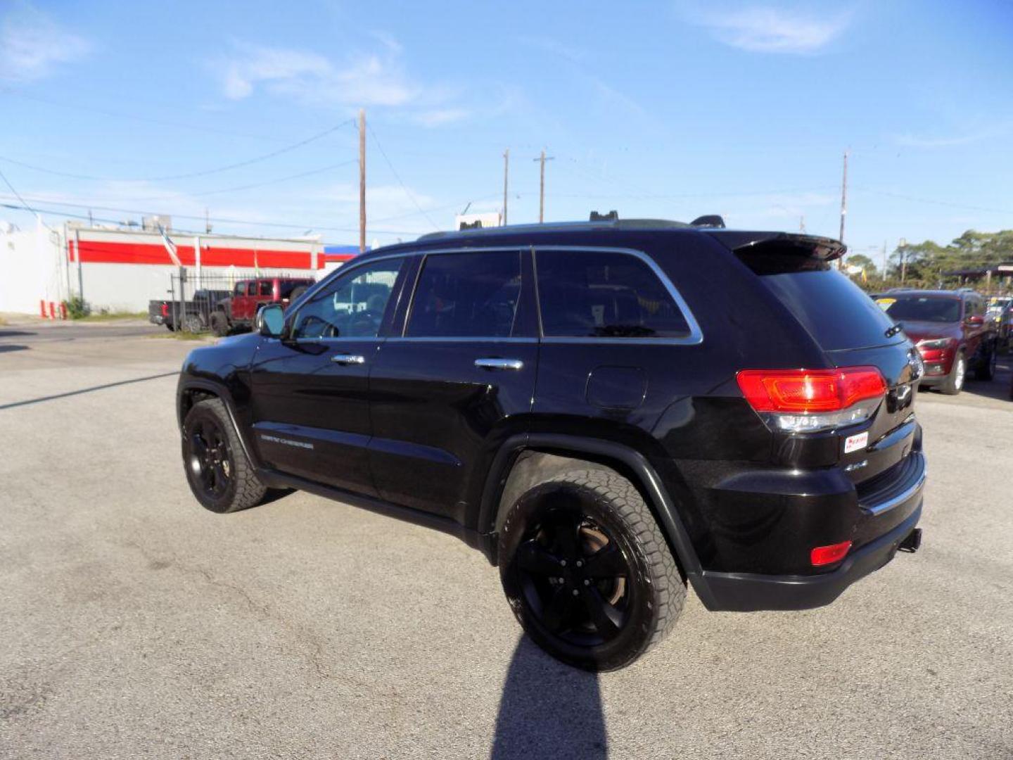 2015 BLACK JEEP GRAND CHEROKEE LIMITED (1C4RJFBG2FC) with an 3.6L engine, Automatic transmission, located at 830 E. Canino Rd., Houston, TX, 77037, (281) 405-0440, 38.358219, -81.729942 - Photo#4