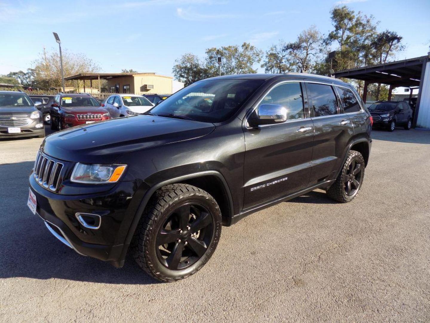 2015 BLACK JEEP GRAND CHEROKEE LIMITED (1C4RJFBG2FC) with an 3.6L engine, Automatic transmission, located at 830 E. Canino Rd., Houston, TX, 77037, (281) 405-0440, 38.358219, -81.729942 - Photo#5