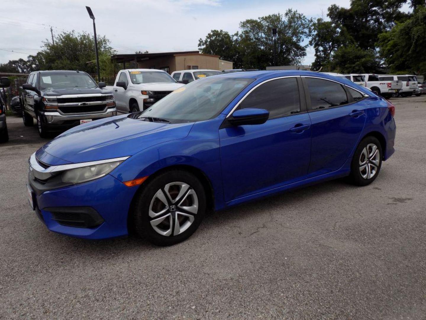 2017 BLUE HONDA CIVIC LX (19XFC2F52HE) with an 2.0L engine, Continuously Variable transmission, located at 830 E. Canino Rd., Houston, TX, 77037, (281) 405-0440, 38.358219, -81.729942 - RCVD TITLE - Photo#1