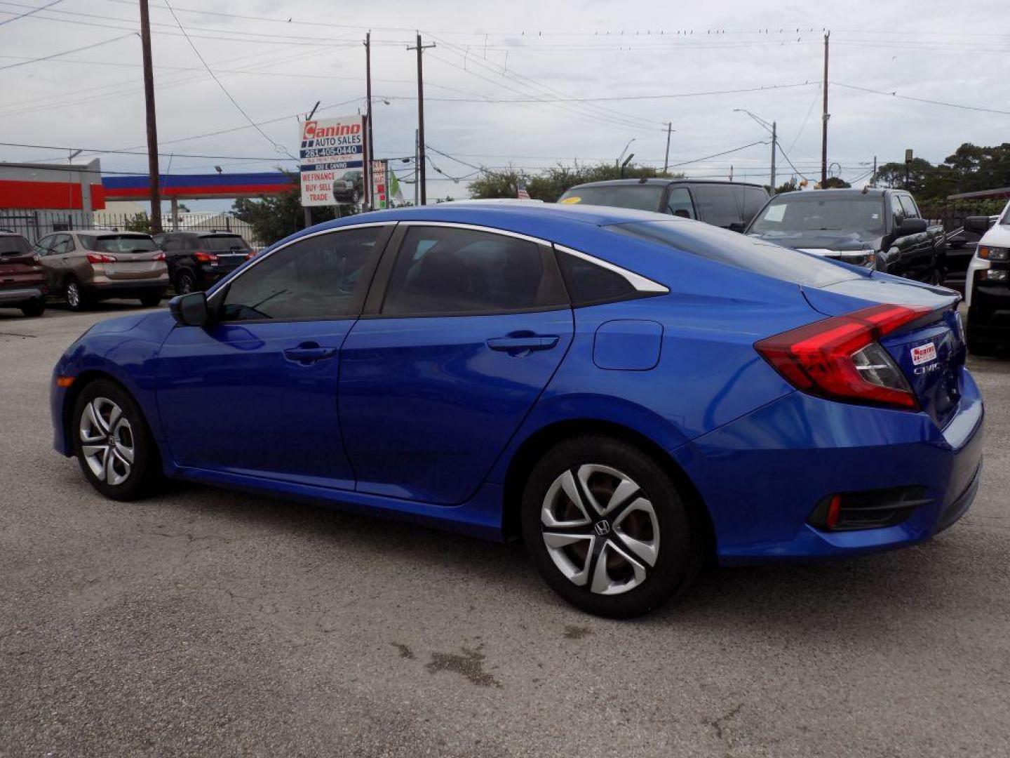 2017 BLUE HONDA CIVIC LX (19XFC2F52HE) with an 2.0L engine, Continuously Variable transmission, located at 830 E. Canino Rd., Houston, TX, 77037, (281) 405-0440, 38.358219, -81.729942 - RCVD TITLE - Photo#3