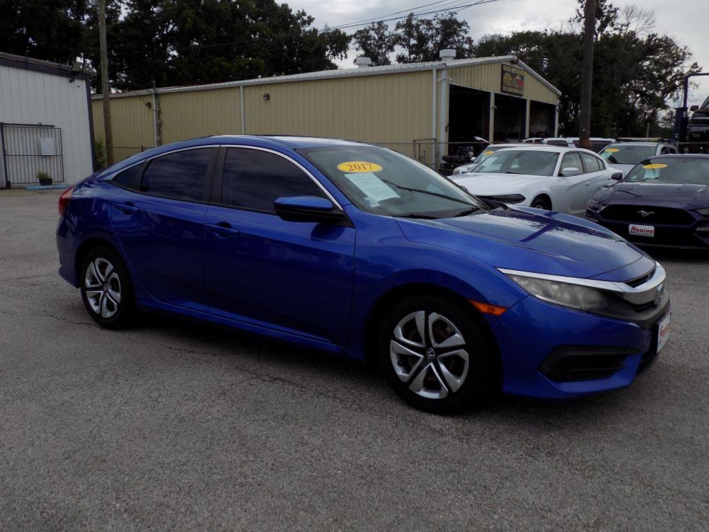 2017 BLUE HONDA CIVIC LX (19XFC2F52HE) with an 2.0L engine, Continuously Variable transmission, located at 830 E. Canino Rd., Houston, TX, 77037, (281) 405-0440, 38.358219, -81.729942 - RCVD TITLE - Photo#7