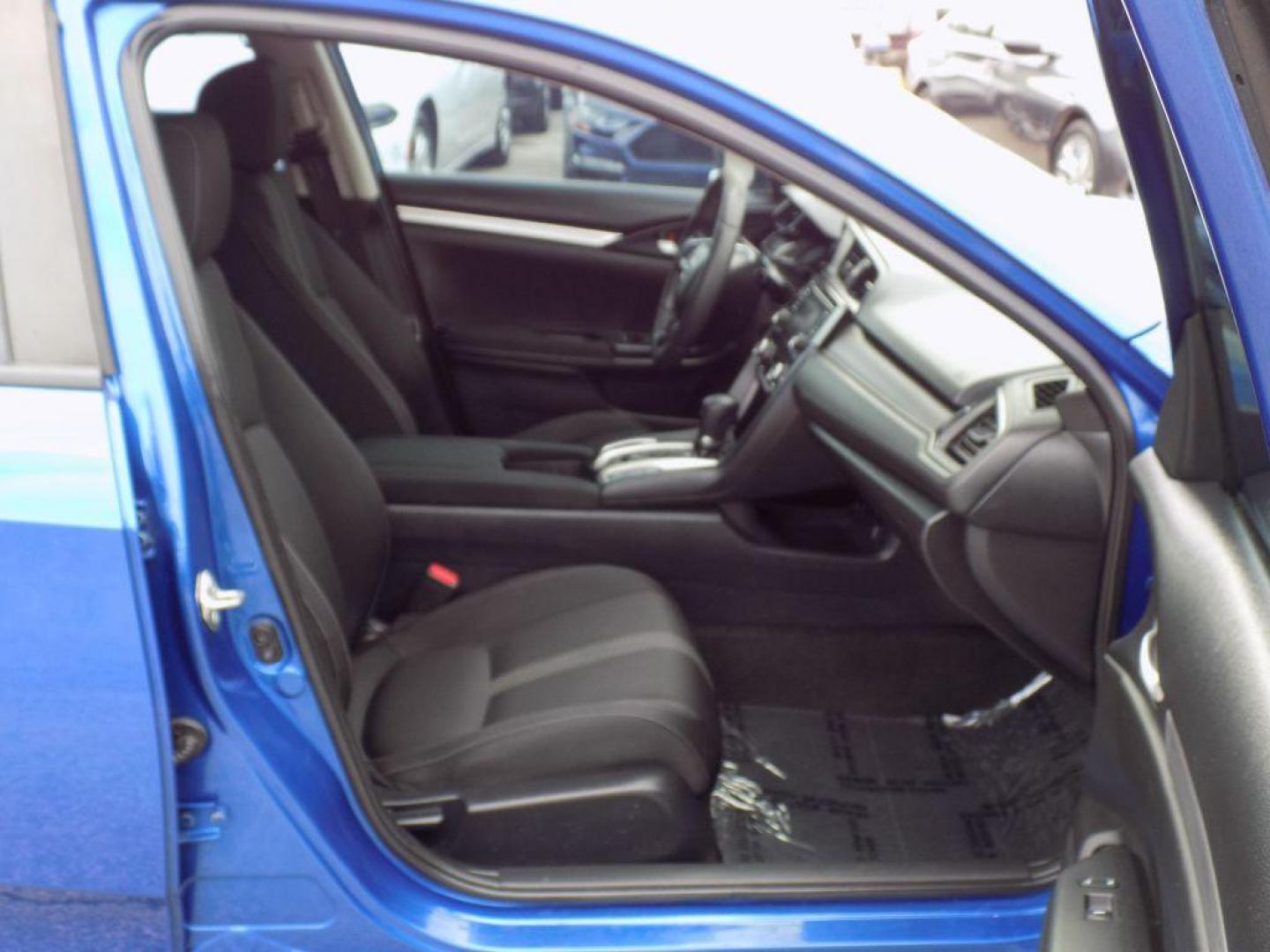 2017 BLUE HONDA CIVIC LX (19XFC2F52HE) with an 2.0L engine, Continuously Variable transmission, located at 830 E. Canino Rd., Houston, TX, 77037, (281) 405-0440, 38.358219, -81.729942 - RCVD TITLE - Photo#12