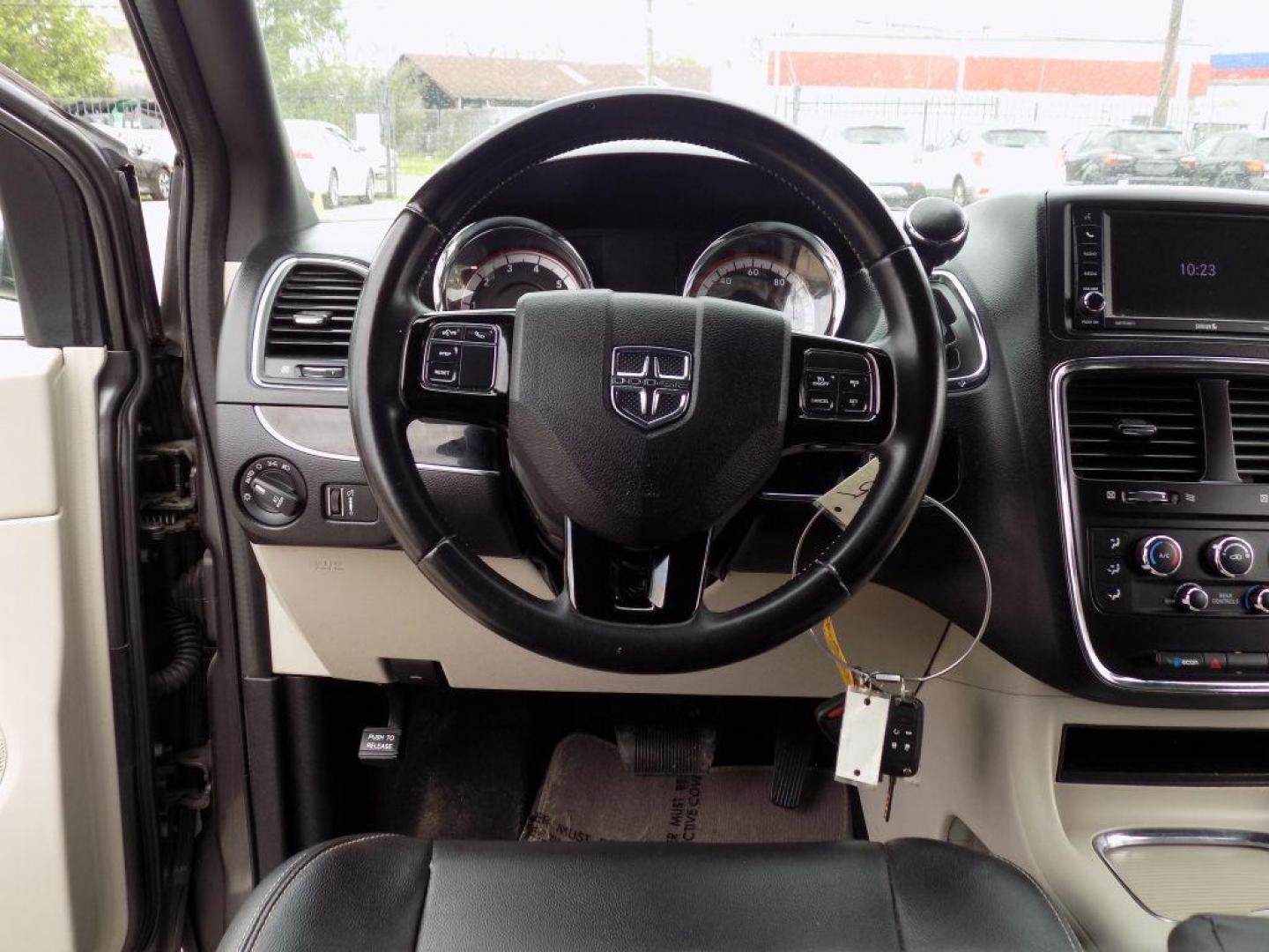 2019 GRAY DODGE GRAND CARAVAN SXT (2C4RDGCG3KR) with an 3.6L engine, Automatic transmission, located at 830 E. Canino Rd., Houston, TX, 77037, (281) 405-0440, 38.358219, -81.729942 - Photo#12