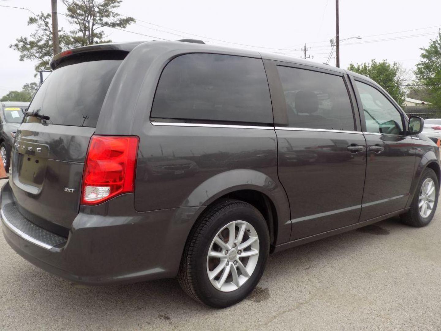 2019 GRAY DODGE GRAND CARAVAN SXT (2C4RDGCG3KR) with an 3.6L engine, Automatic transmission, located at 830 E. Canino Rd., Houston, TX, 77037, (281) 405-0440, 38.358219, -81.729942 - Photo#4