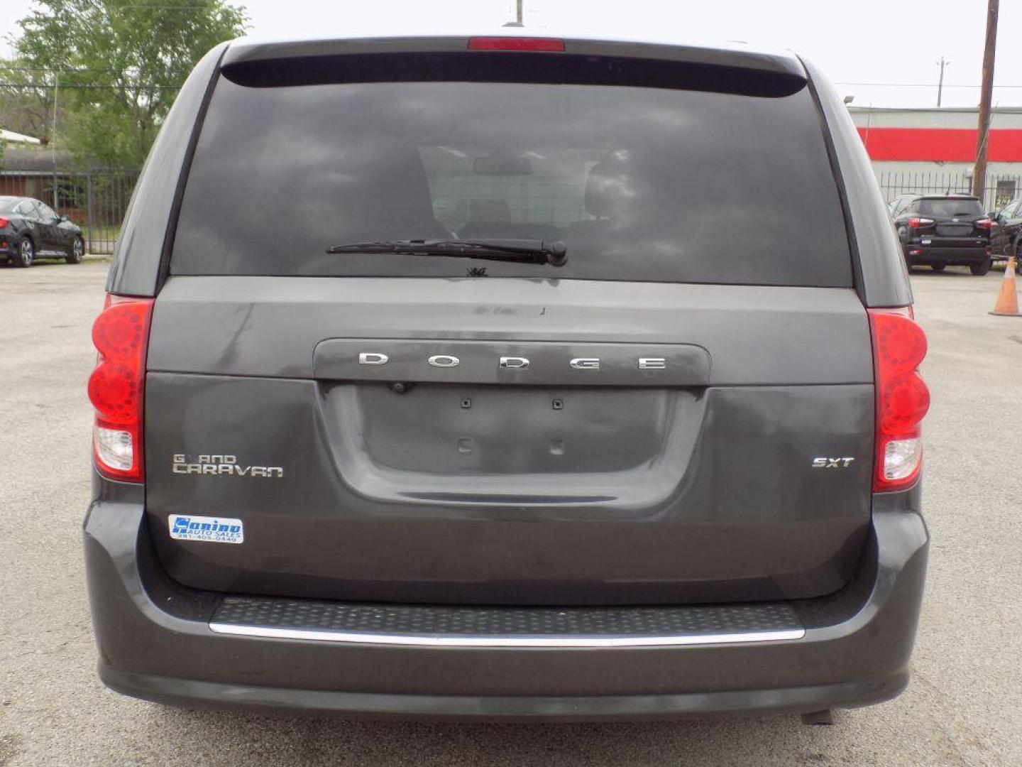 2019 GRAY DODGE GRAND CARAVAN SXT (2C4RDGCG3KR) with an 3.6L engine, Automatic transmission, located at 830 E. Canino Rd., Houston, TX, 77037, (281) 405-0440, 38.358219, -81.729942 - Photo#5