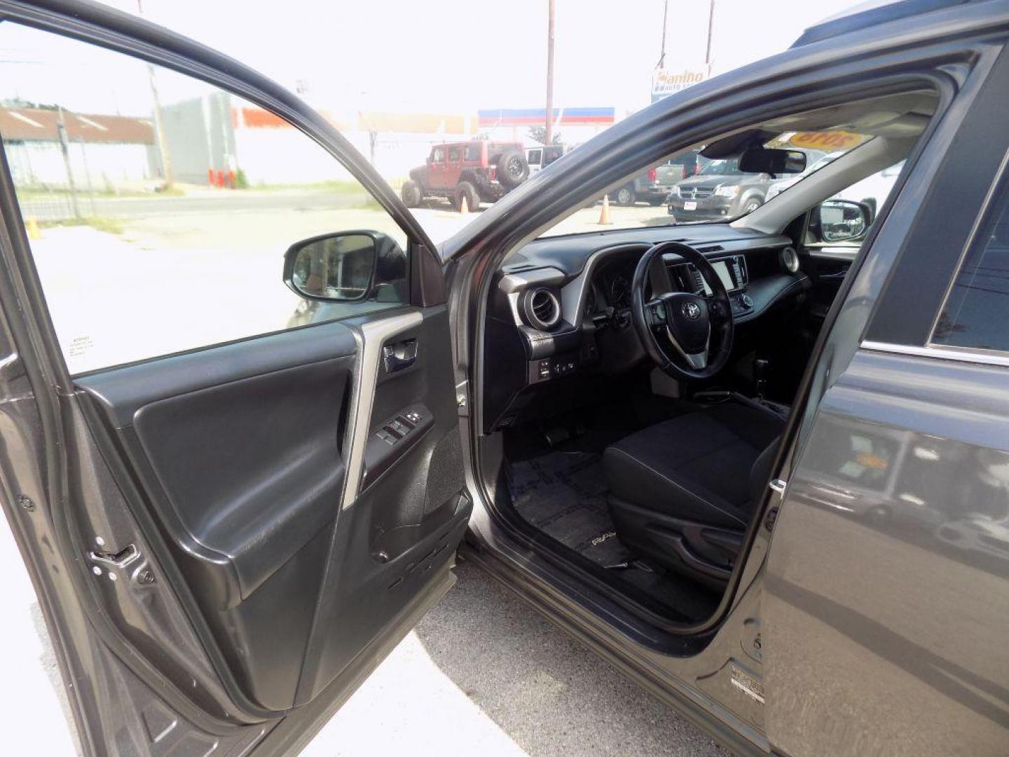 2018 GRAY TOYOTA RAV4 ADVENTURE (2T3WFREV7JW) with an 2.5L engine, Automatic transmission, located at 830 E. Canino Rd., Houston, TX, 77037, (281) 405-0440, 38.358219, -81.729942 - Photo#9