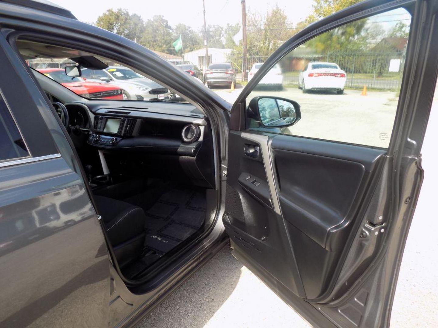 2018 GRAY TOYOTA RAV4 ADVENTURE (2T3WFREV7JW) with an 2.5L engine, Automatic transmission, located at 830 E. Canino Rd., Houston, TX, 77037, (281) 405-0440, 38.358219, -81.729942 - Photo#16