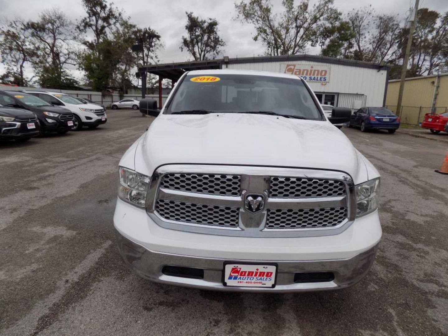 2018 WHITE RAM 1500 SLT (1C6RR6GG6JS) with an 3.6L engine, Automatic transmission, located at 830 E. Canino Rd., Houston, TX, 77037, (281) 405-0440, 38.358219, -81.729942 - Photo#0