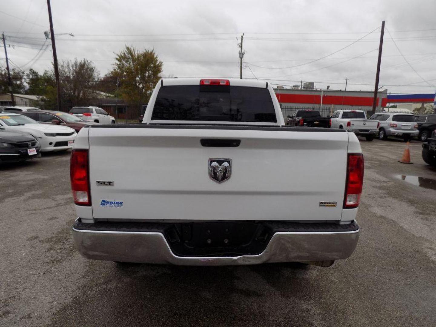 2018 WHITE RAM 1500 SLT (1C6RR6GG6JS) with an 3.6L engine, Automatic transmission, located at 830 E. Canino Rd., Houston, TX, 77037, (281) 405-0440, 38.358219, -81.729942 - Photo#2