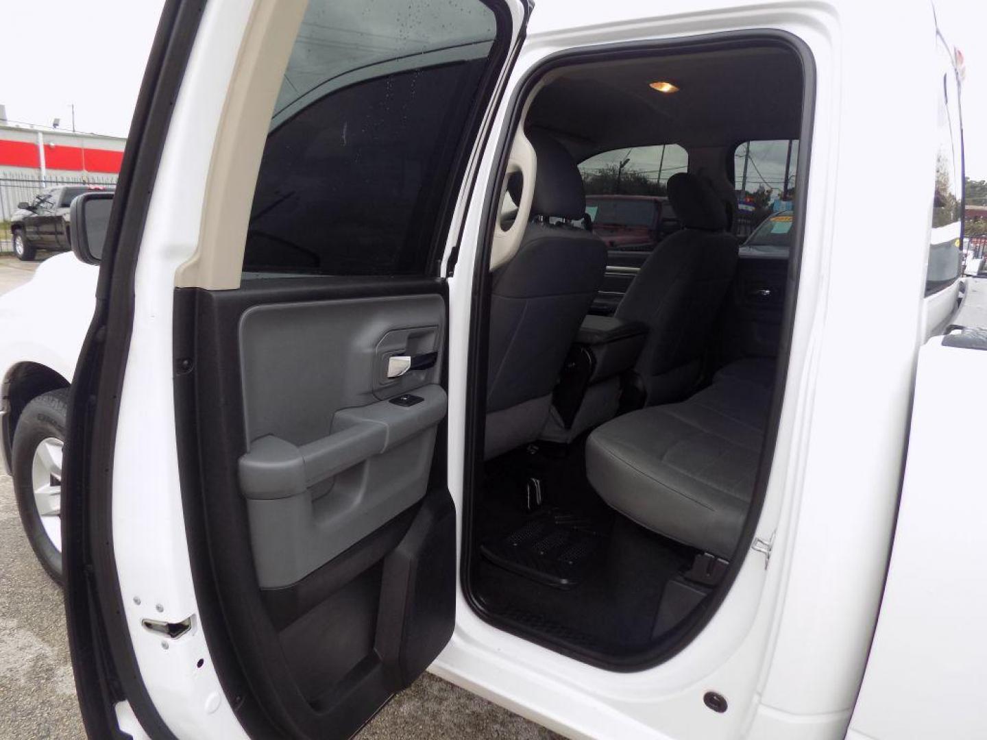 2018 WHITE RAM 1500 SLT (1C6RR6GG6JS) with an 3.6L engine, Automatic transmission, located at 830 E. Canino Rd., Houston, TX, 77037, (281) 405-0440, 38.358219, -81.729942 - Photo#12