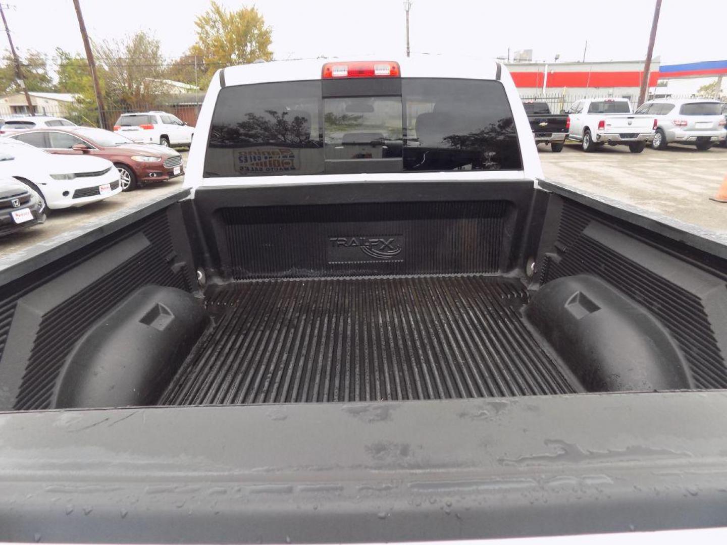 2018 WHITE RAM 1500 SLT (1C6RR6GG6JS) with an 3.6L engine, Automatic transmission, located at 830 E. Canino Rd., Houston, TX, 77037, (281) 405-0440, 38.358219, -81.729942 - Photo#21