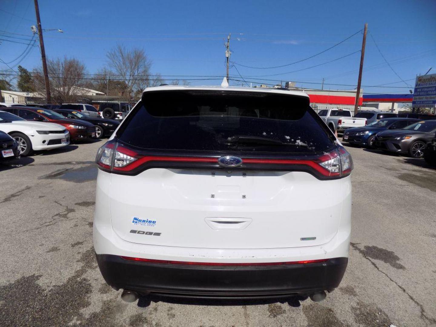 2018 WHITE FORD EDGE SE (2FMPK3G93JB) with an 2.0L engine, Automatic transmission, located at 830 E. Canino Rd., Houston, TX, 77037, (281) 405-0440, 38.358219, -81.729942 - Photo#3