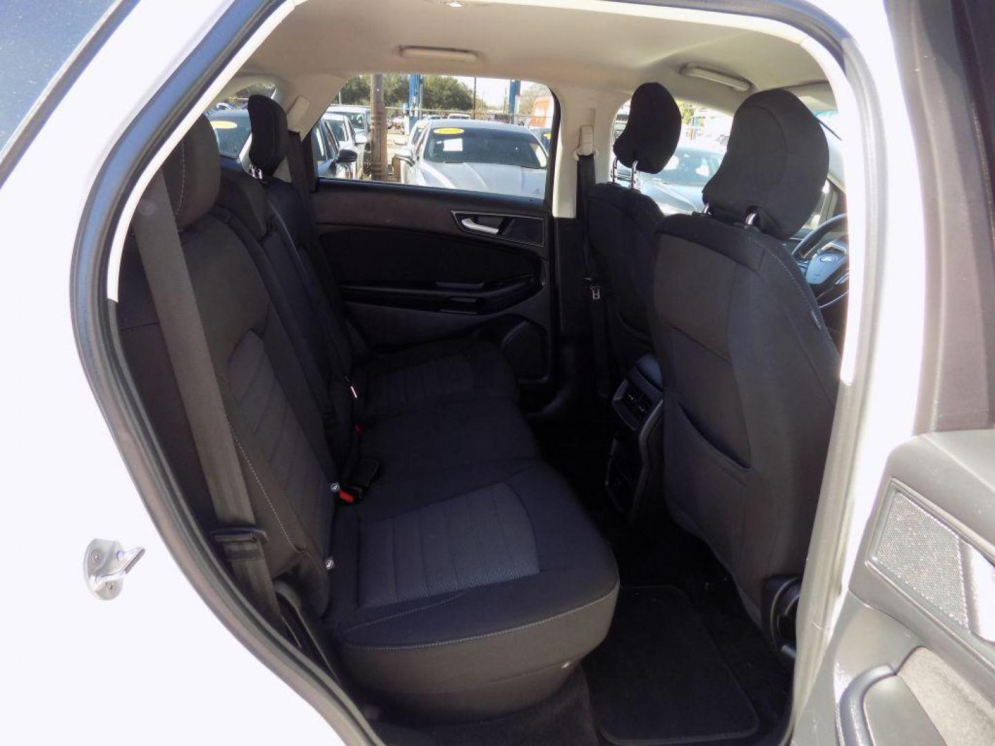 2018 WHITE FORD EDGE SE (2FMPK3G93JB) with an 2.0L engine, Automatic transmission, located at 830 E. Canino Rd., Houston, TX, 77037, (281) 405-0440, 38.358219, -81.729942 - Photo#12