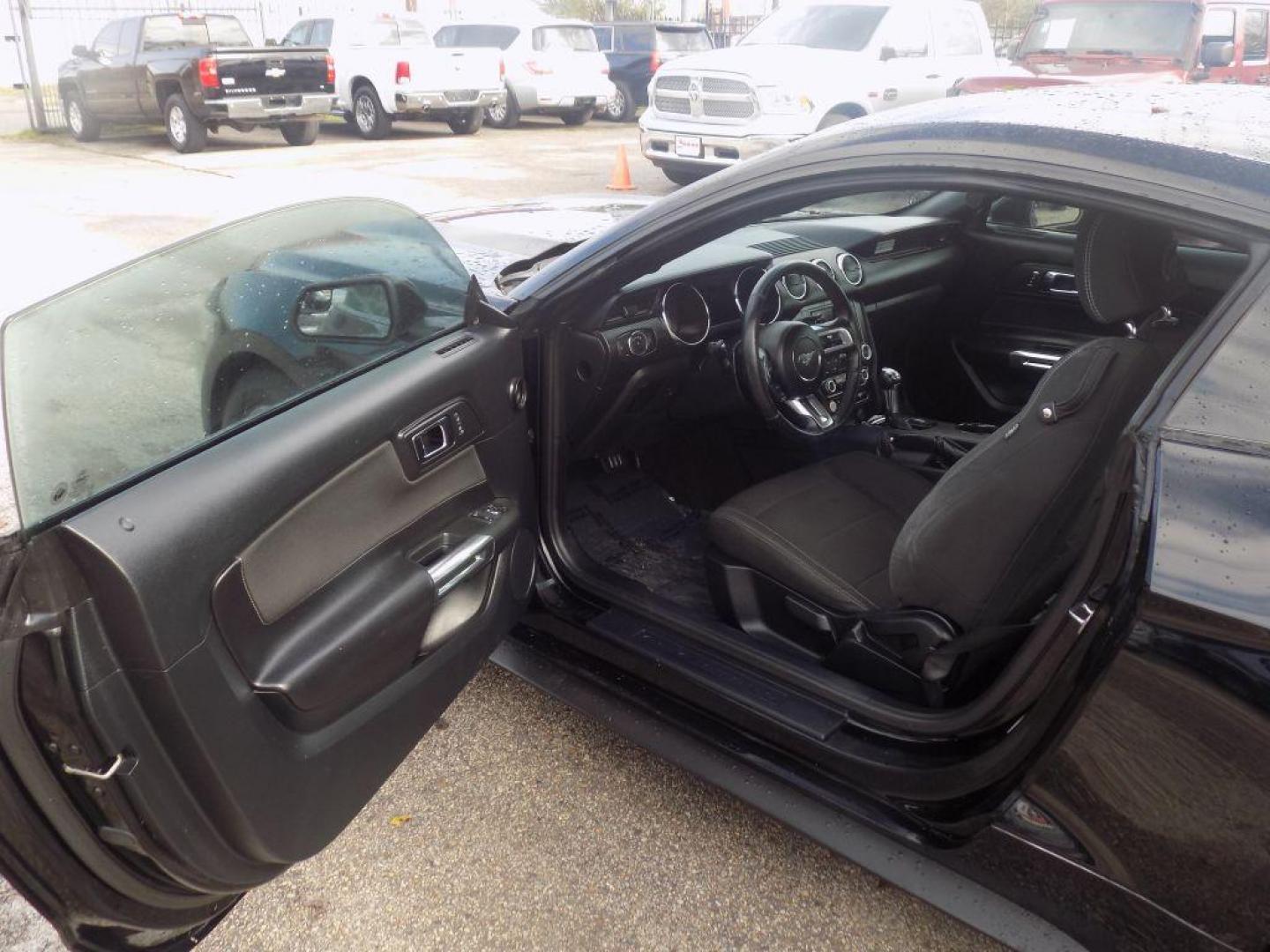 2016 BLACK FORD MUSTANG (1FA6P8AM2G5) with an 3.7L engine, Automatic transmission, located at 830 E. Canino Rd., Houston, TX, 77037, (281) 405-0440, 38.358219, -81.729942 - Photo#10