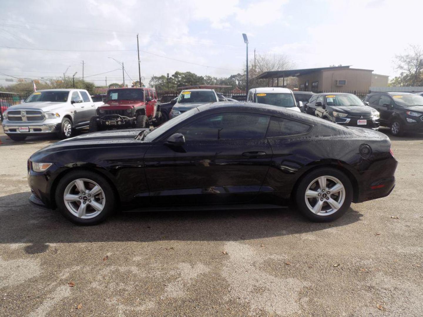 2016 BLACK FORD MUSTANG (1FA6P8AM2G5) with an 3.7L engine, Automatic transmission, located at 830 E. Canino Rd., Houston, TX, 77037, (281) 405-0440, 38.358219, -81.729942 - Photo#3
