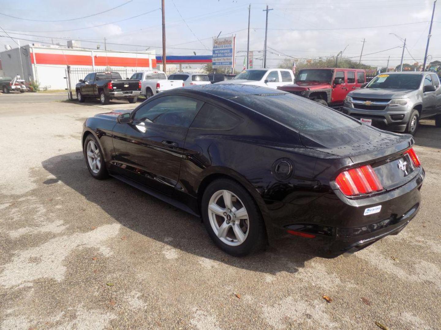 2016 BLACK FORD MUSTANG (1FA6P8AM2G5) with an 3.7L engine, Automatic transmission, located at 830 E. Canino Rd., Houston, TX, 77037, (281) 405-0440, 38.358219, -81.729942 - Photo#4